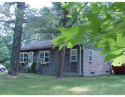 127 County Road Freetown, MA 02717 - Photo 2 of 3 a view of a backyard with plants and large tree