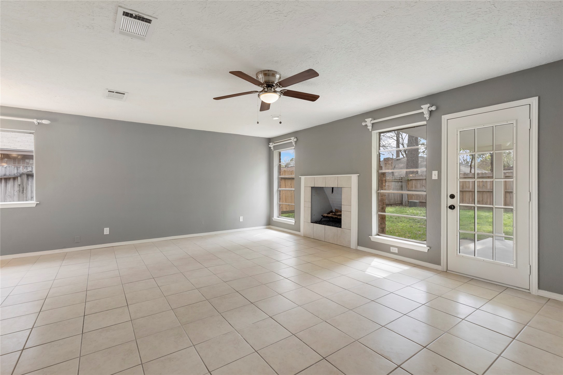 29107 Binefield Street Spring, TX 77386 - Photo 13 of 33 Family room. Blinds to be installed soon! Fireplace is decorative only and is not functional.