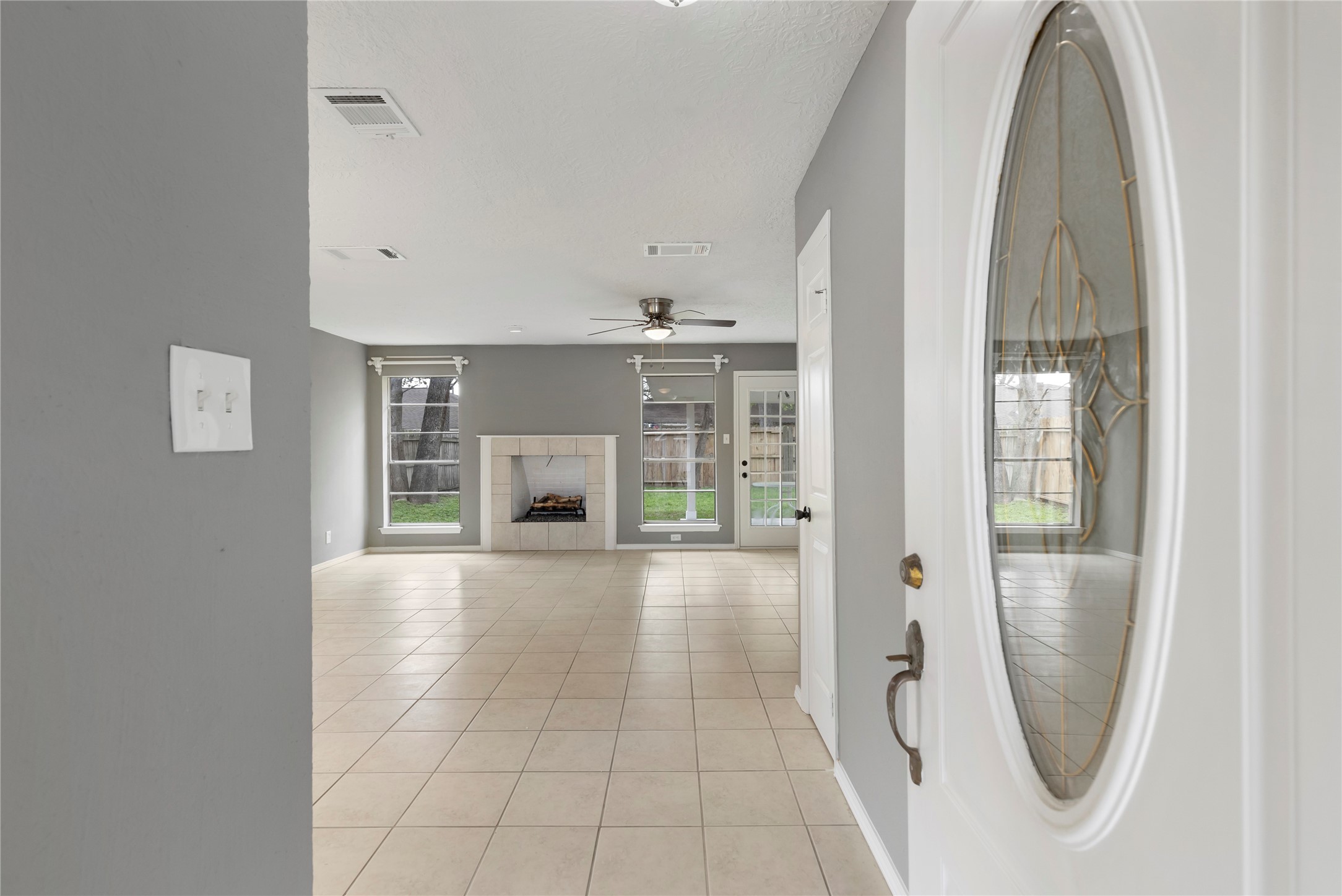 29107 Binefield Street Spring, TX 77386 - Photo 4 of 33 Enjoy natural light throughout the entire home! *Fireplace is decorative only*