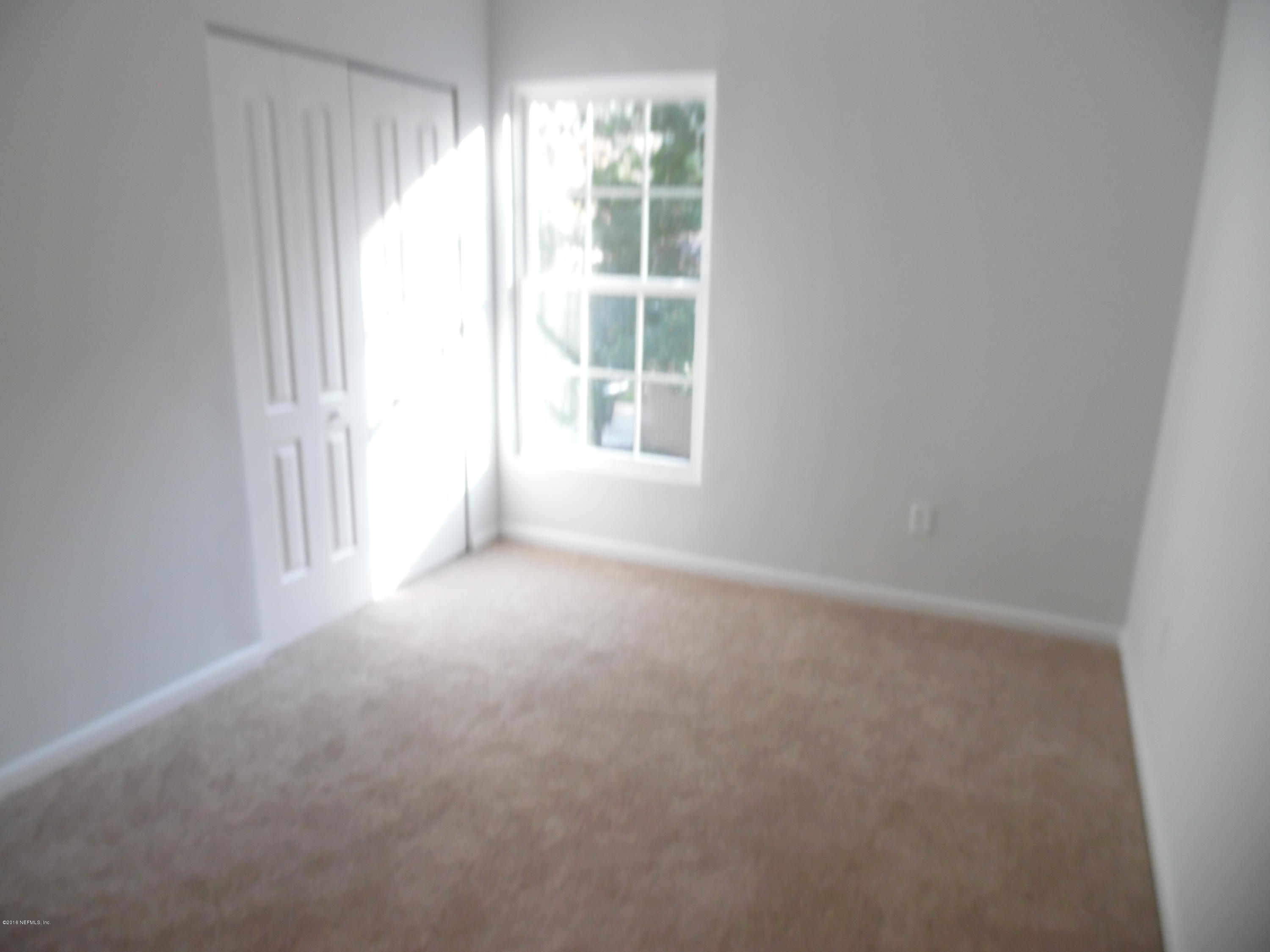 10244 Pine Breeze Road South Jacksonville, FL 32257 - Photo 20 of 27 a view of empty room with window