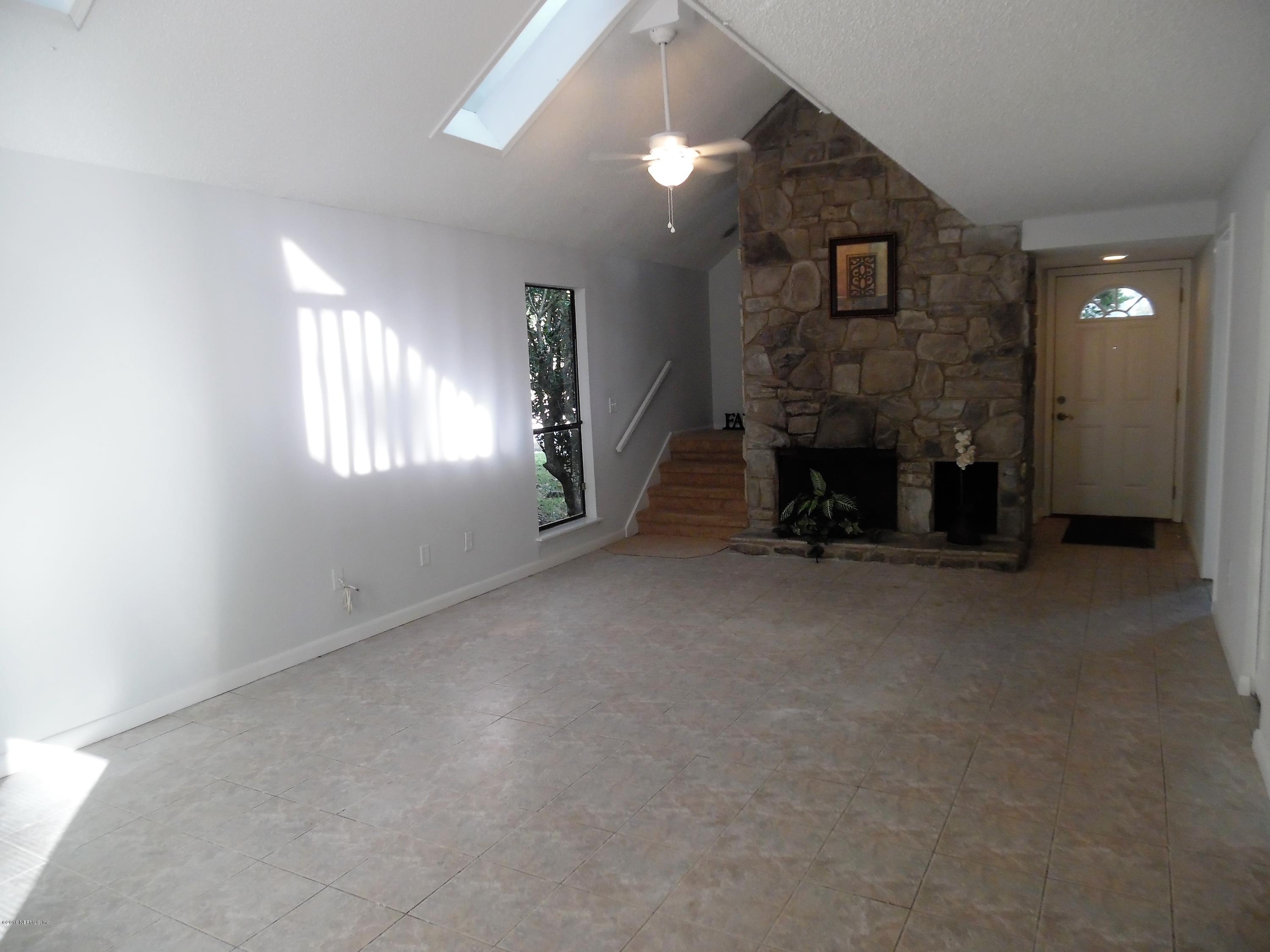 10244 Pine Breeze Road South Jacksonville, FL 32257 - Photo 10 of 27 a view of a livingroom with a fireplace