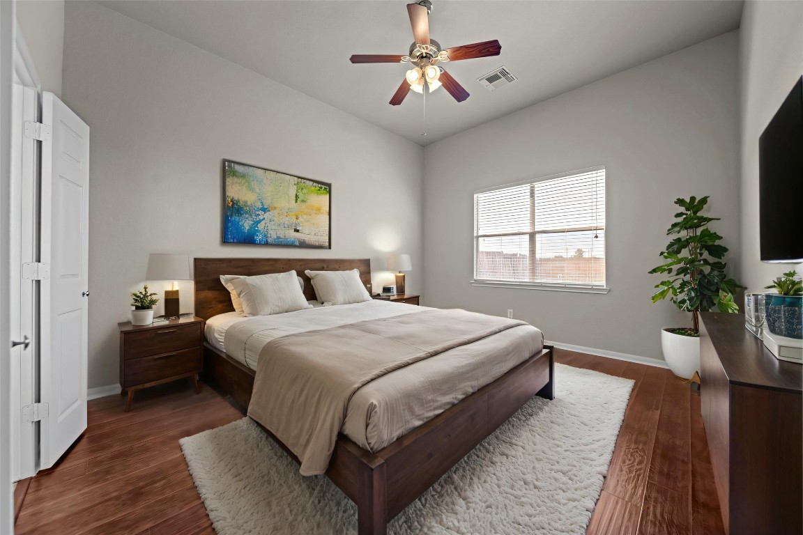 6047 Northcrest Village Way Spring, TX 77388 - Photo 13 of 30 a bedroom with bed and a window