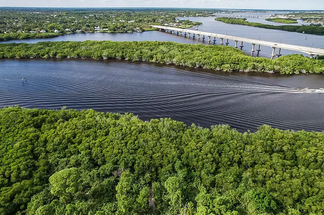 an aerial view of a garden and lake view
