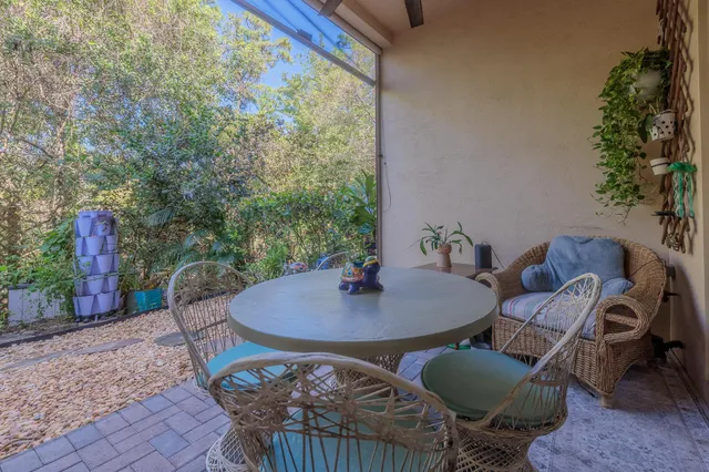a outdoor dining space with furniture and outdoor seating