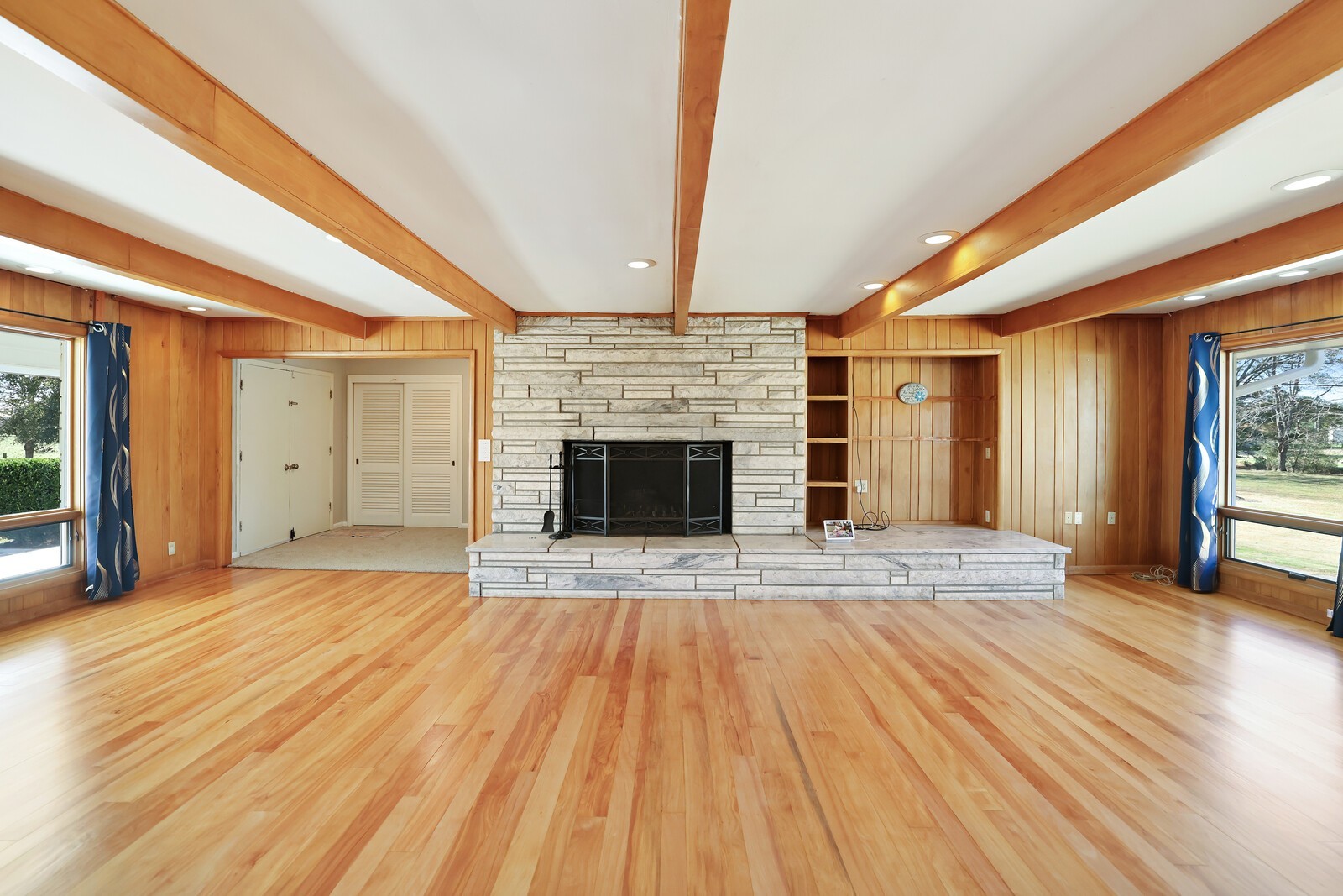676 Ferguson Hill Road Lafayette, TN 37083 - Photo 8 of 89 a view of empty room with wooden floor and fireplace