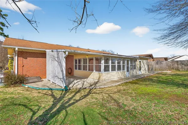 a view of an house with backyard space