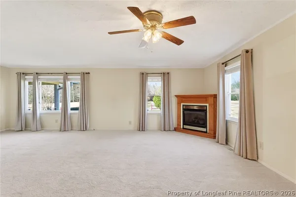 a view of a livingroom with a fireplace