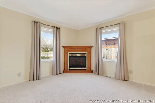 a view of a livingroom with a fireplace