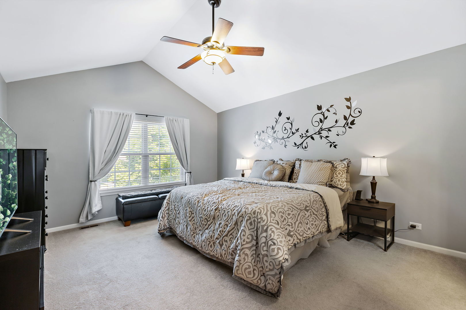 954 Oak Ridge Boulevard Elgin, IL 60120 - Photo 11 of 17 a bed room with a bed and a chandelier