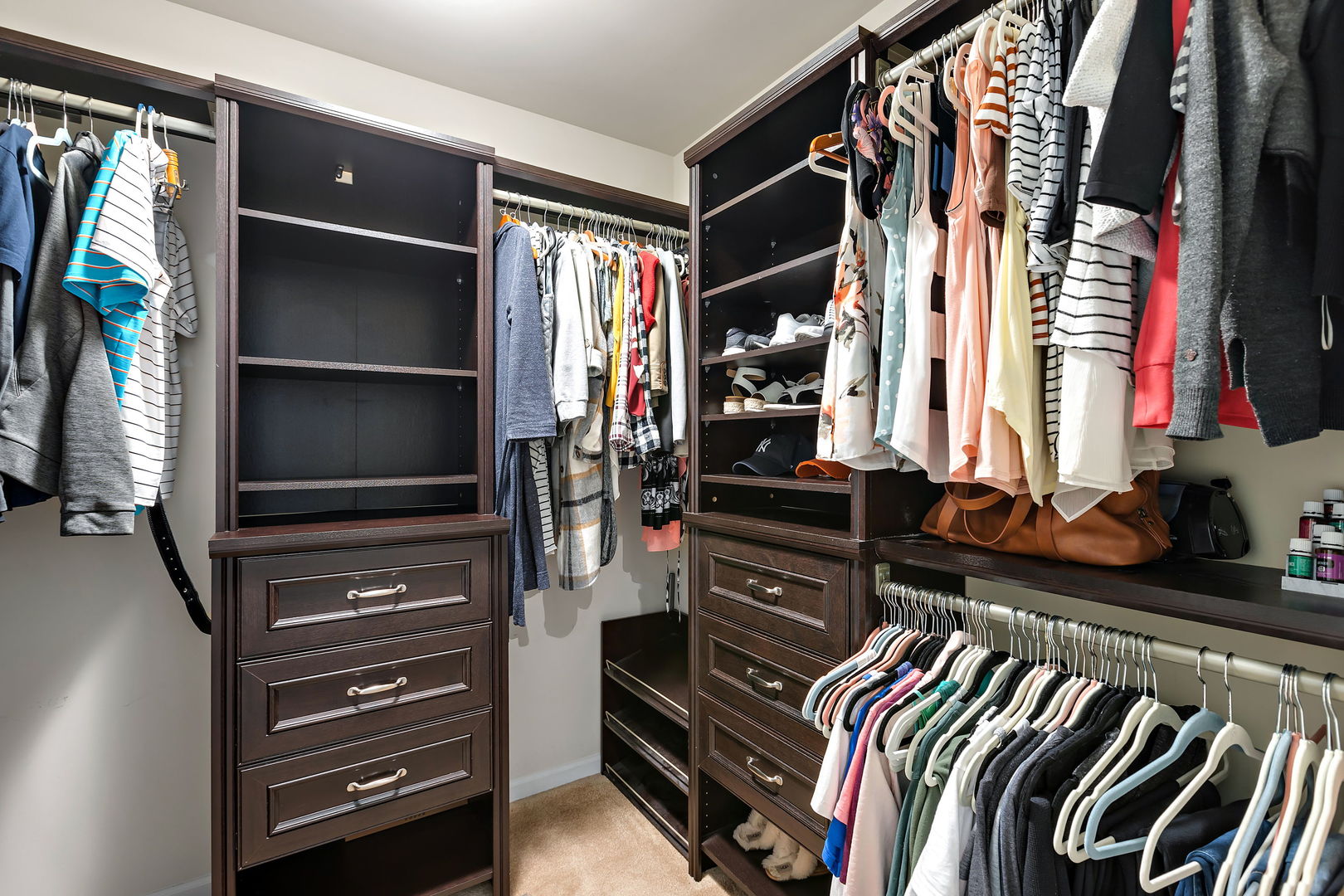 954 Oak Ridge Boulevard Elgin, IL 60120 - Photo 12 of 17 a view of walk in closet with clothes and shoes