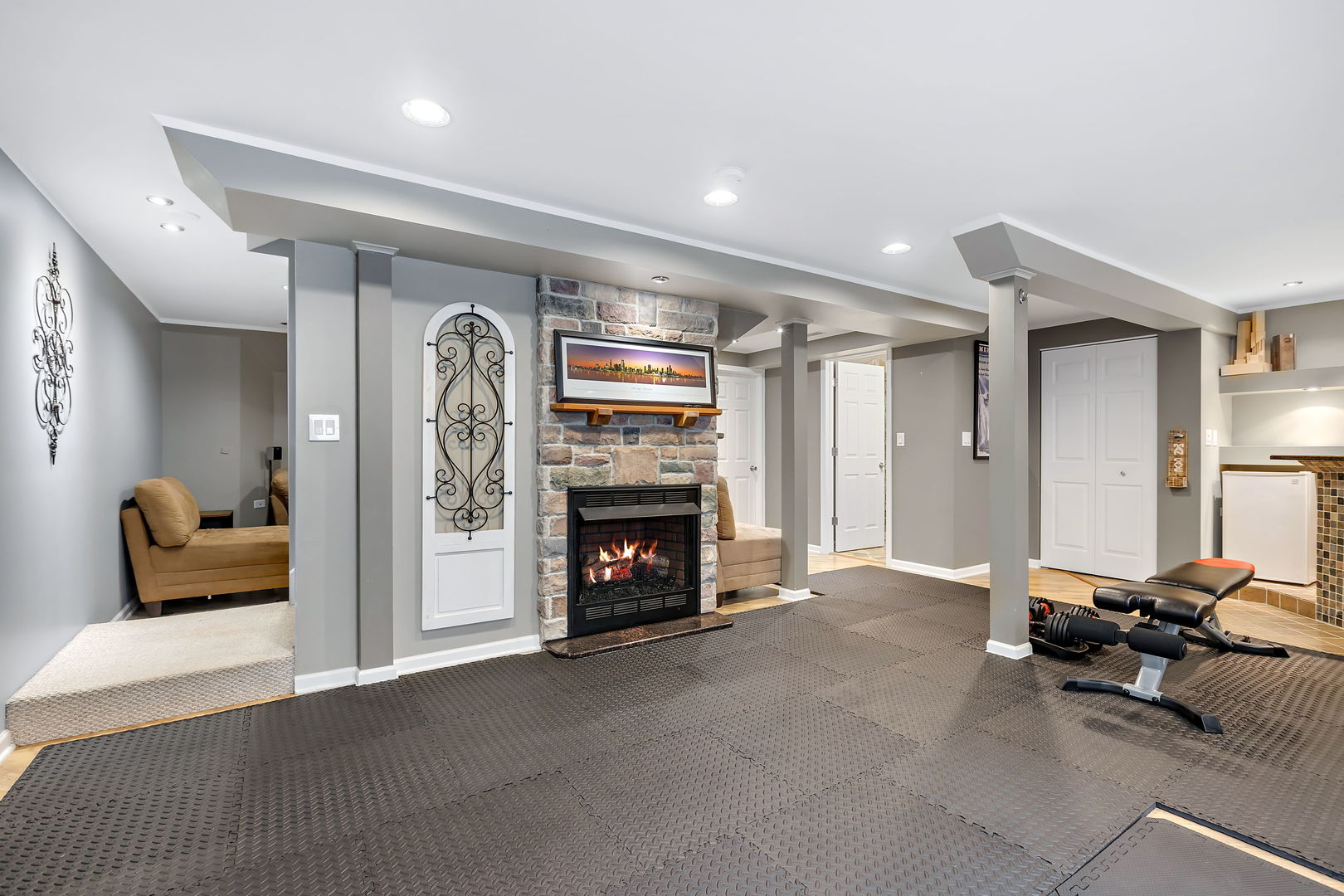 954 Oak Ridge Boulevard Elgin, IL 60120 - Photo 15 of 17 a living room with furniture and a fireplace