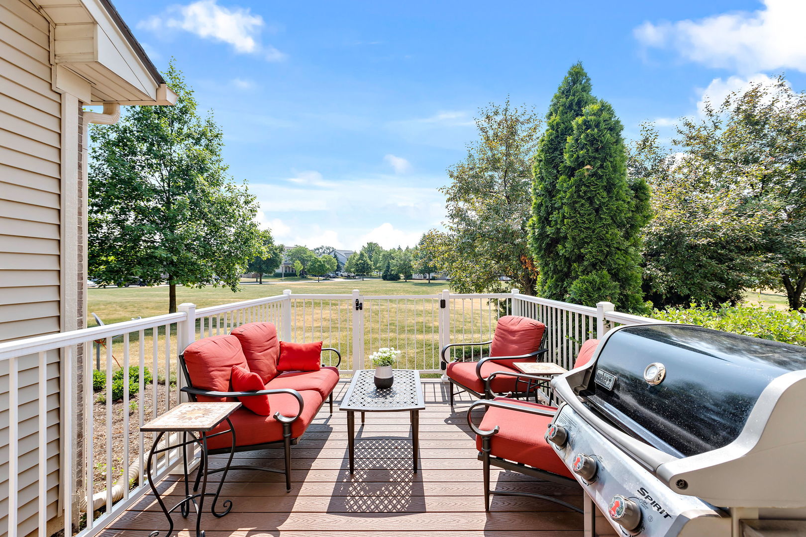 954 Oak Ridge Boulevard Elgin, IL 60120 - Photo 17 of 17 an outdoor sitting area with furniture and a garden