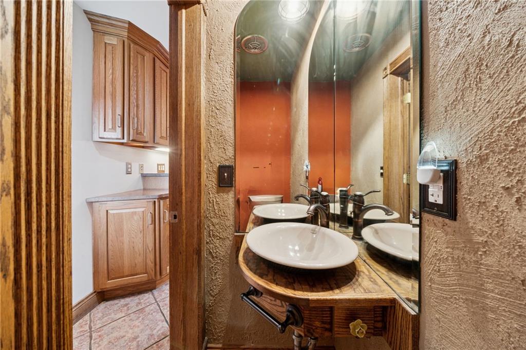 2 Deerfield Lane Indiana, PA 15701 - Photo 13 of 43 a bathroom with a granite countertop sink and a mirror