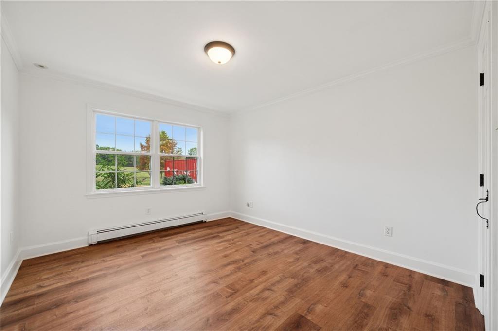 2 Deerfield Lane Indiana, PA 15701 - Photo 14 of 43 an empty room with wooden floor and windows
