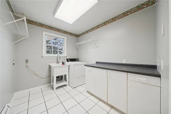 a view of an empty room with windows