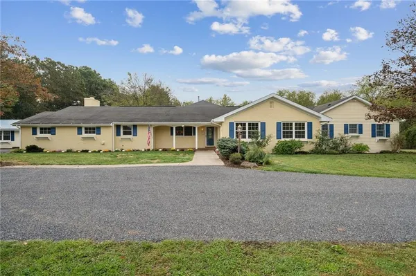 a front view of house with yard
