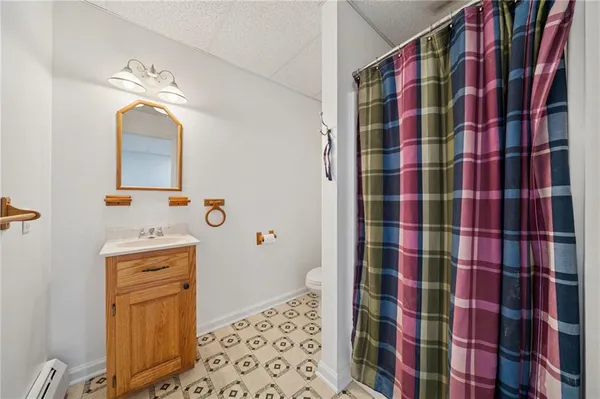 a bathroom with a sink a vanity and a mirror