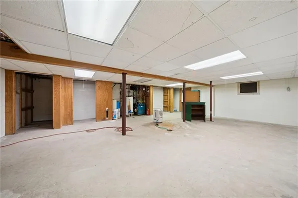 a view of a livingroom with a patio and a yard