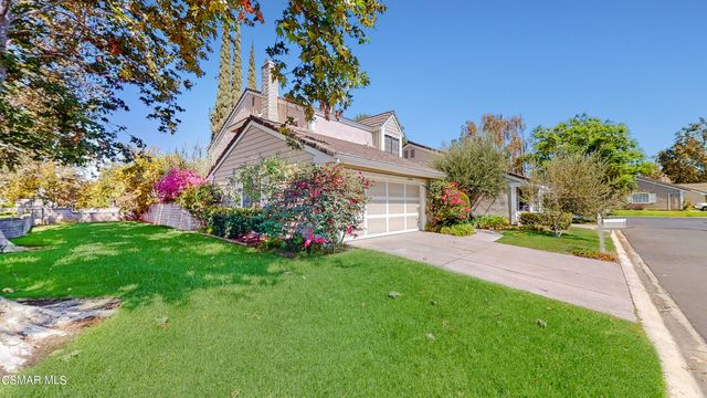 a view of a house with a swimming pool