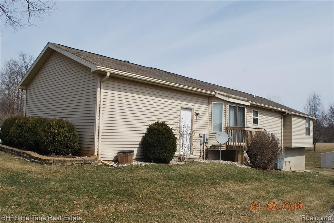 3272 Hogback Road Fowlerville, MI 48836 - Photo 4 of 34 Rear Exterior view