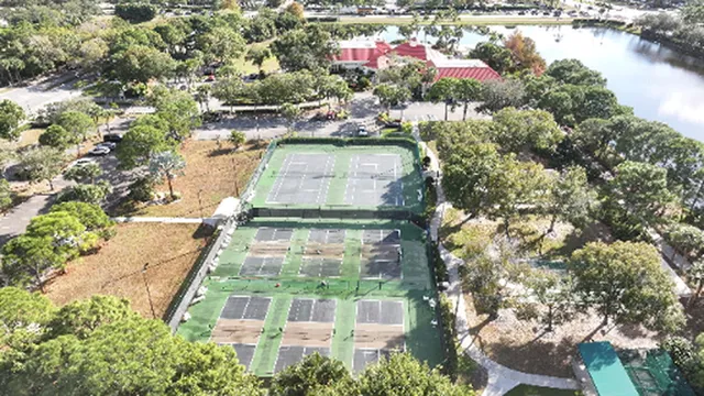 a room with furniture and pool table