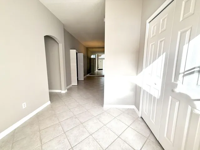 a view of a workspace with furniture