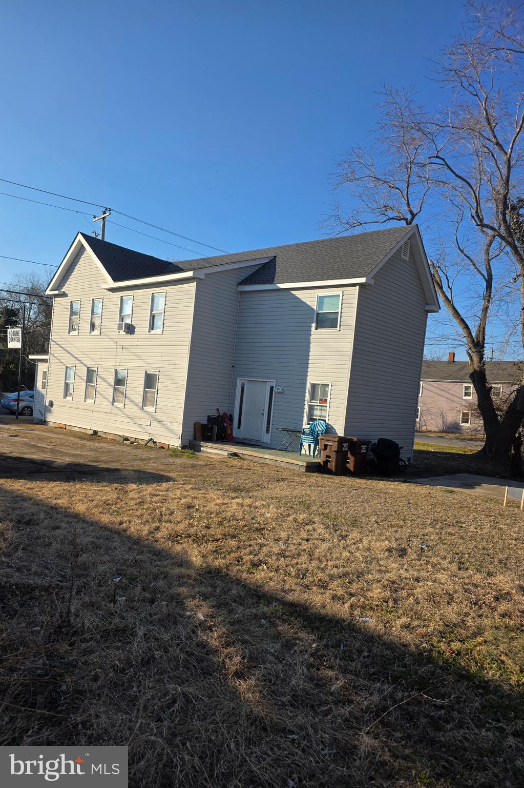 604 Pine Street Cambridge, MD 21613 - Photo 3 of 15 a front view of a house with a yard