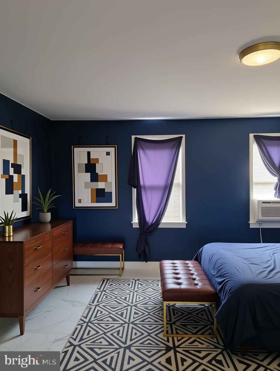 604 Pine Street Cambridge, MD 21613 - Photo 7 of 15 a bedroom with a bed and a dresser in it
