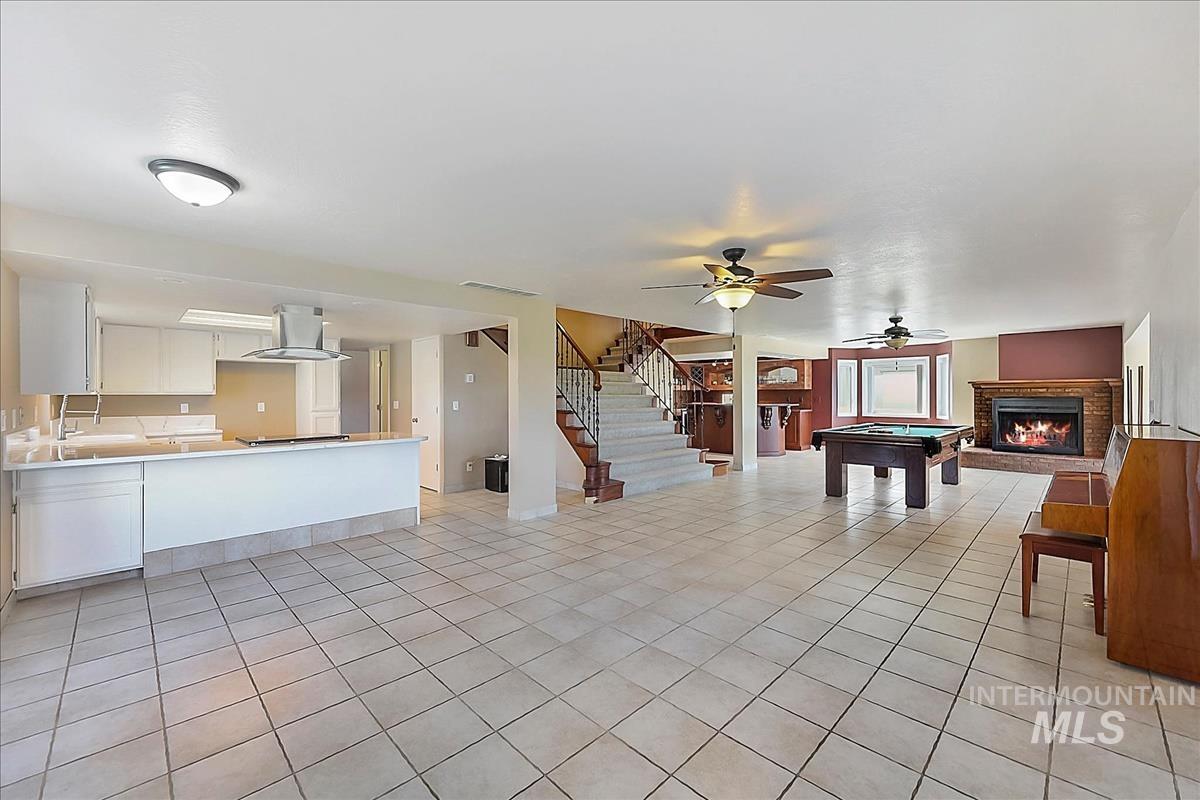 2804 West Sunrise Rim Road Boise, ID 83705 - Photo 5 of 50 Spacious open-concept interior featuring tile flooring