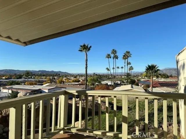 a view of a swimming pool with a patio