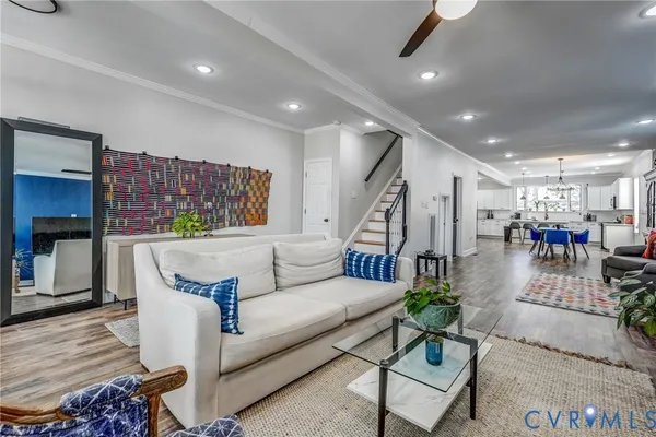 a living room with furniture or couch and a window