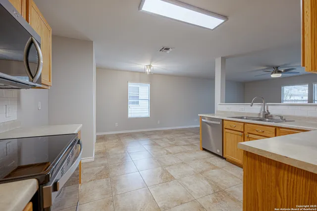 a bathroom with a sink a vanity and mirror
