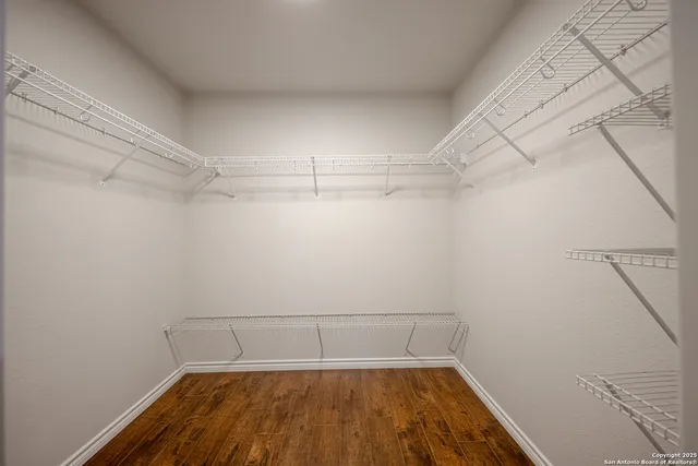 a view of a room with racks on the wall