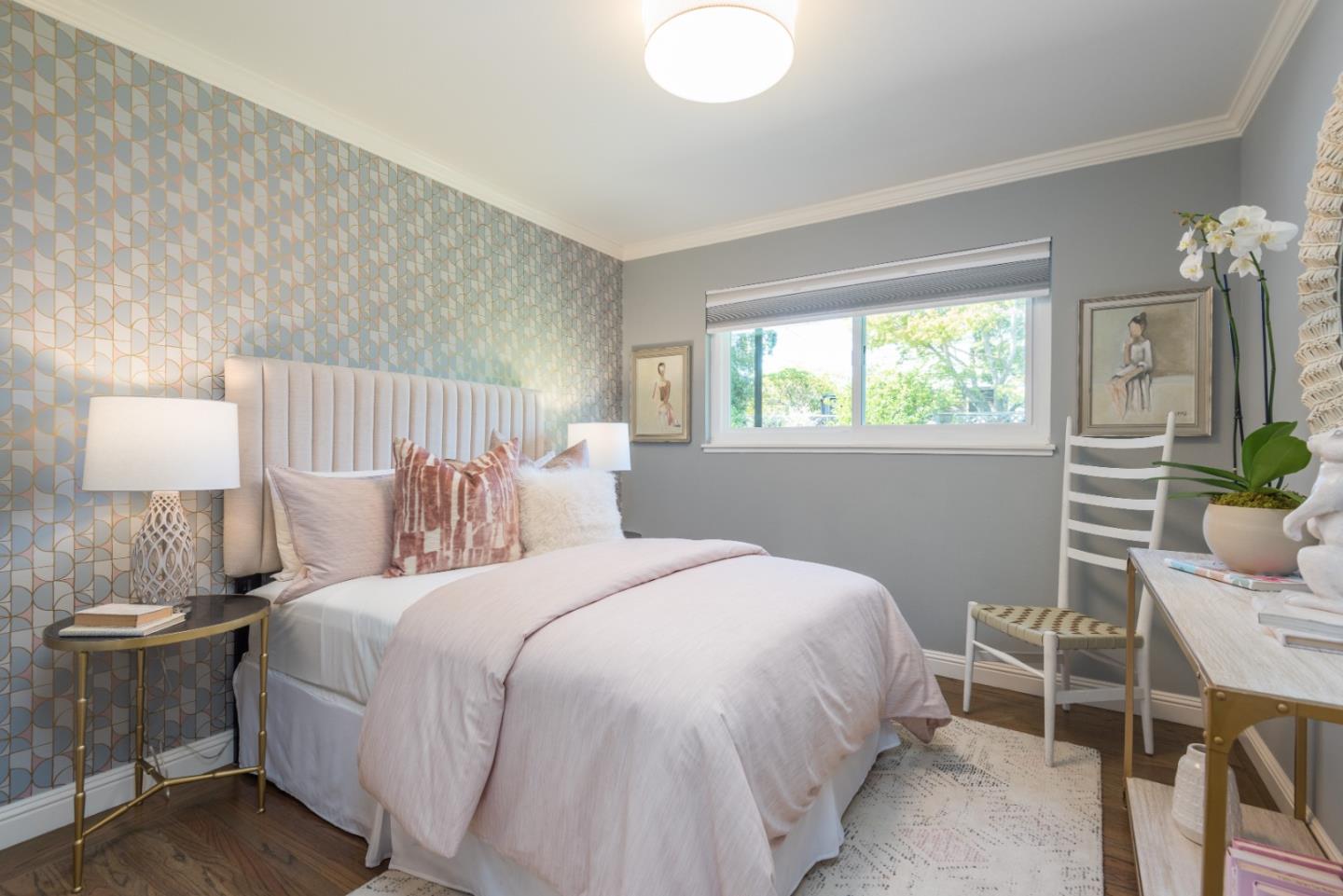 115 Chukker Court San Mateo, CA 94403 - Photo 14 of 23 a bedroom with a bed and a lamp on table