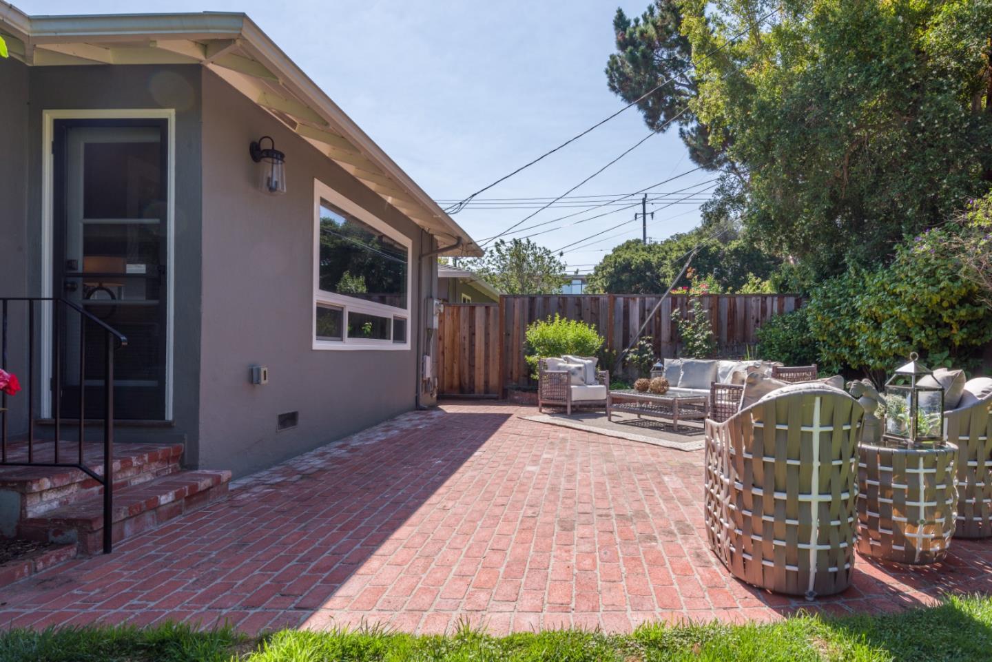 115 Chukker Court San Mateo, CA 94403 - Photo 17 of 23 a view of a backyard with sitting area and furniture