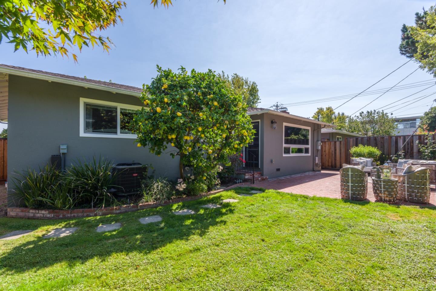 115 Chukker Court San Mateo, CA 94403 - Photo 19 of 23 a front view of a house with patio and garden