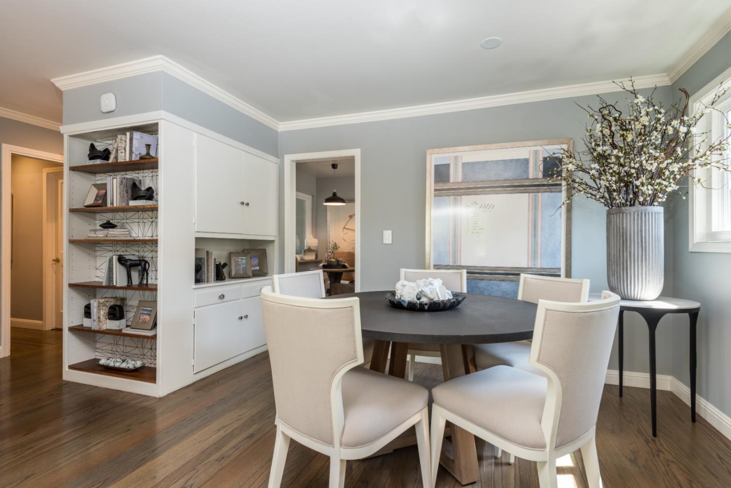 115 Chukker Court San Mateo, CA 94403 - Photo 5 of 23 a view of a dining room with furniture and wooden floor