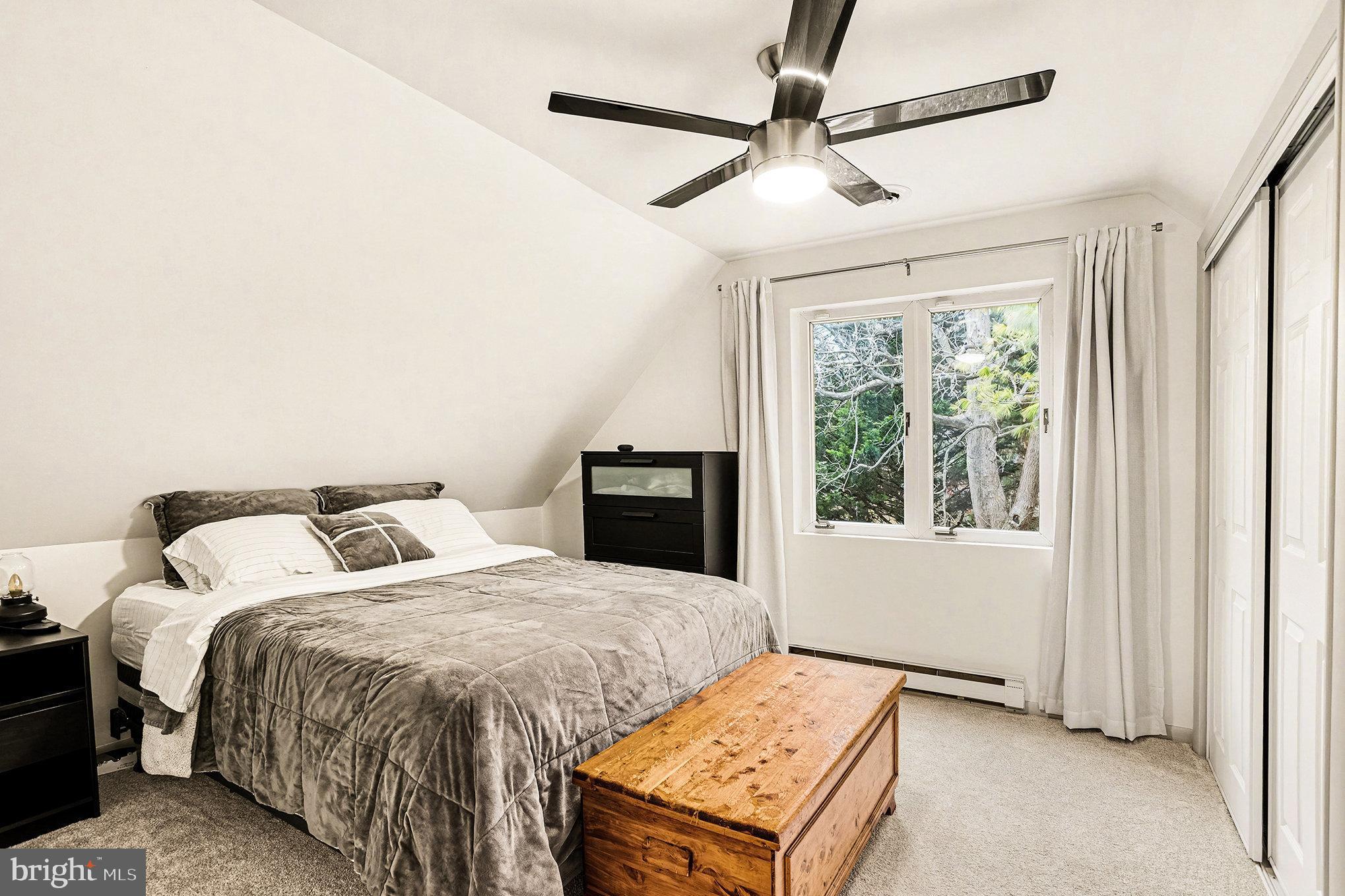 85 Railroad Avenue Glyndon, MD 21071 - Photo 16 of 28 a bedroom with two beds and a window