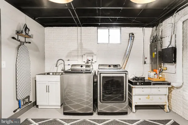 a kitchen with a stove and a white refrigerator