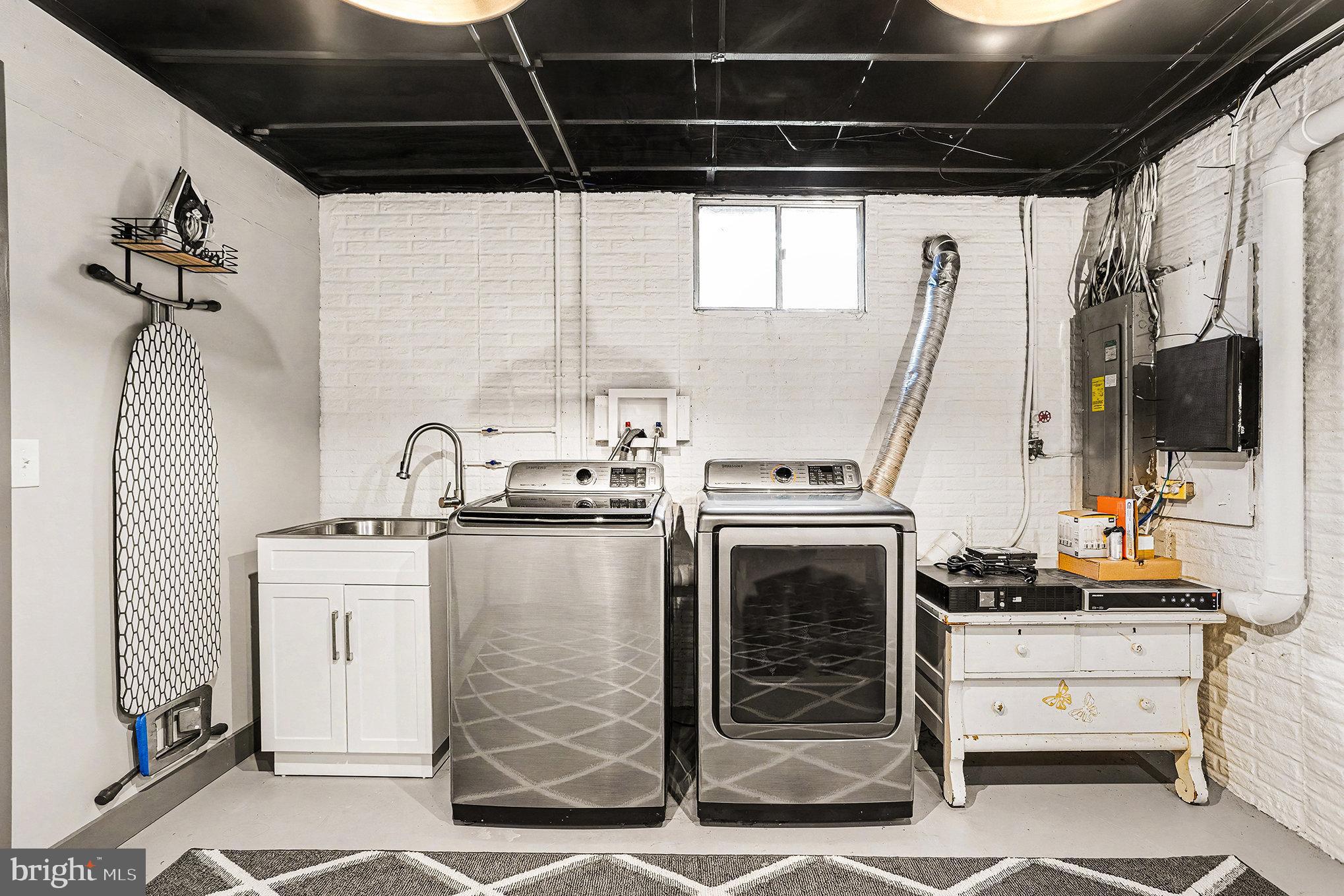 85 Railroad Avenue Glyndon, MD 21071 - Photo 22 of 28 a kitchen with a stove and a white refrigerator