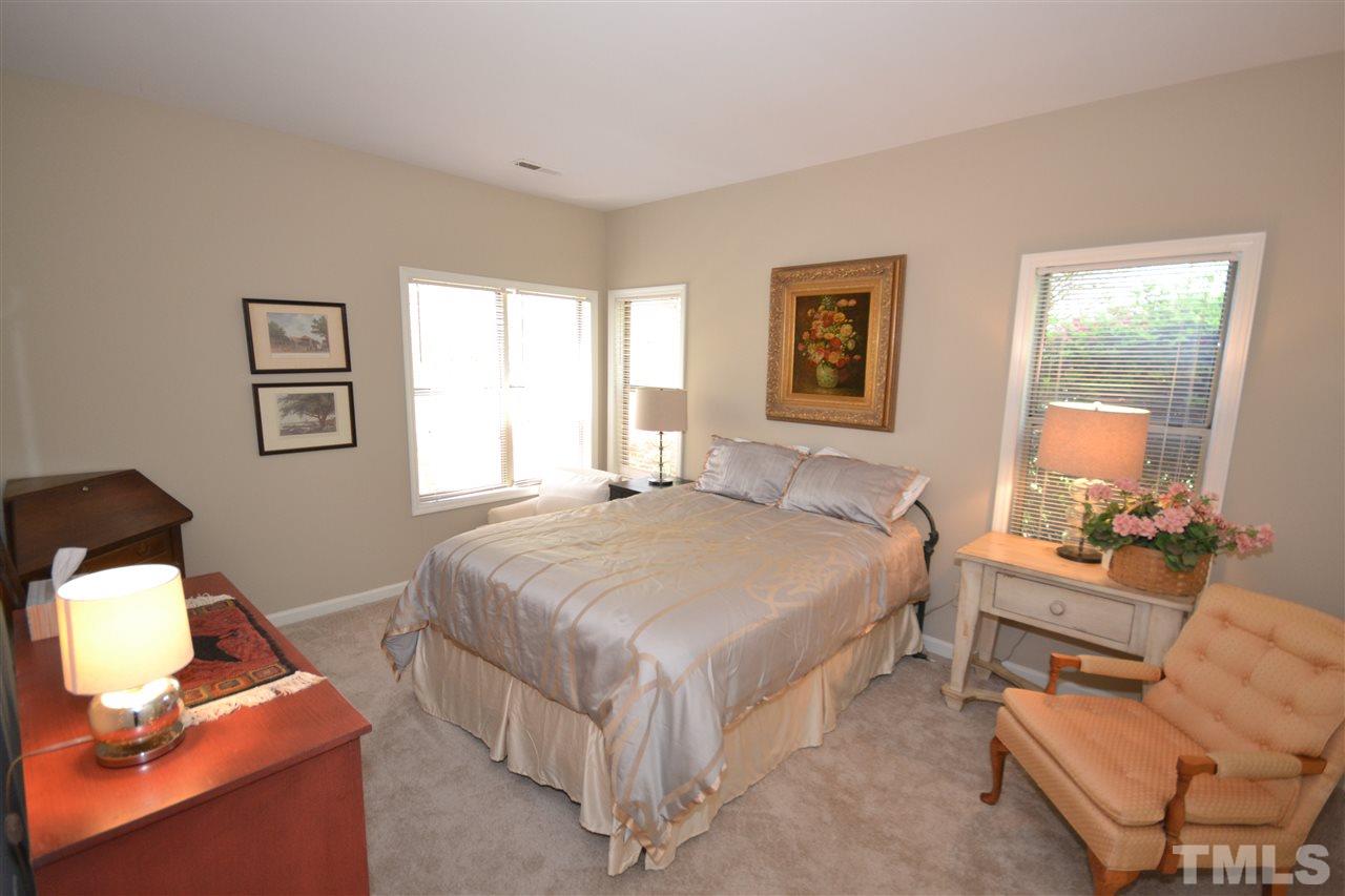 6151 Summer Pointe Place, Unit 103 Raleigh, NC 27606 - Photo 9 of 12 Dual master bedrooms with lots of windows. Room for sitting area. Two large closets in each!