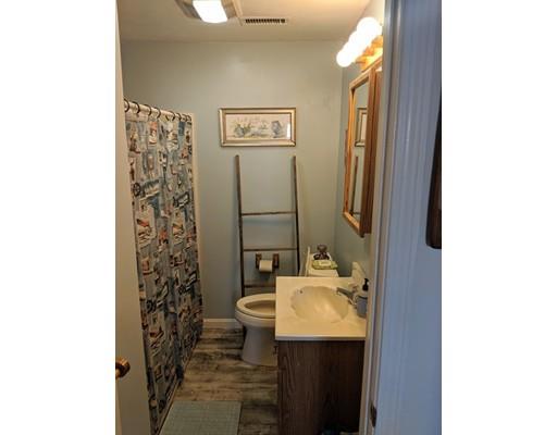 172 Swifts Beach Road Wareham, MA 02571 - Photo 13 of 23 a bathroom with a sink toilet and shower