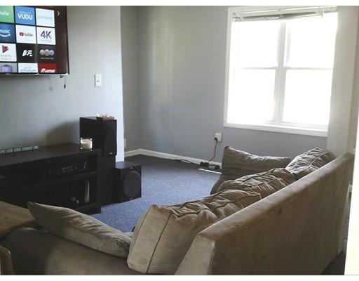 172 Swifts Beach Road Wareham, MA 02571 - Photo 18 of 23 a living room with furniture and two window