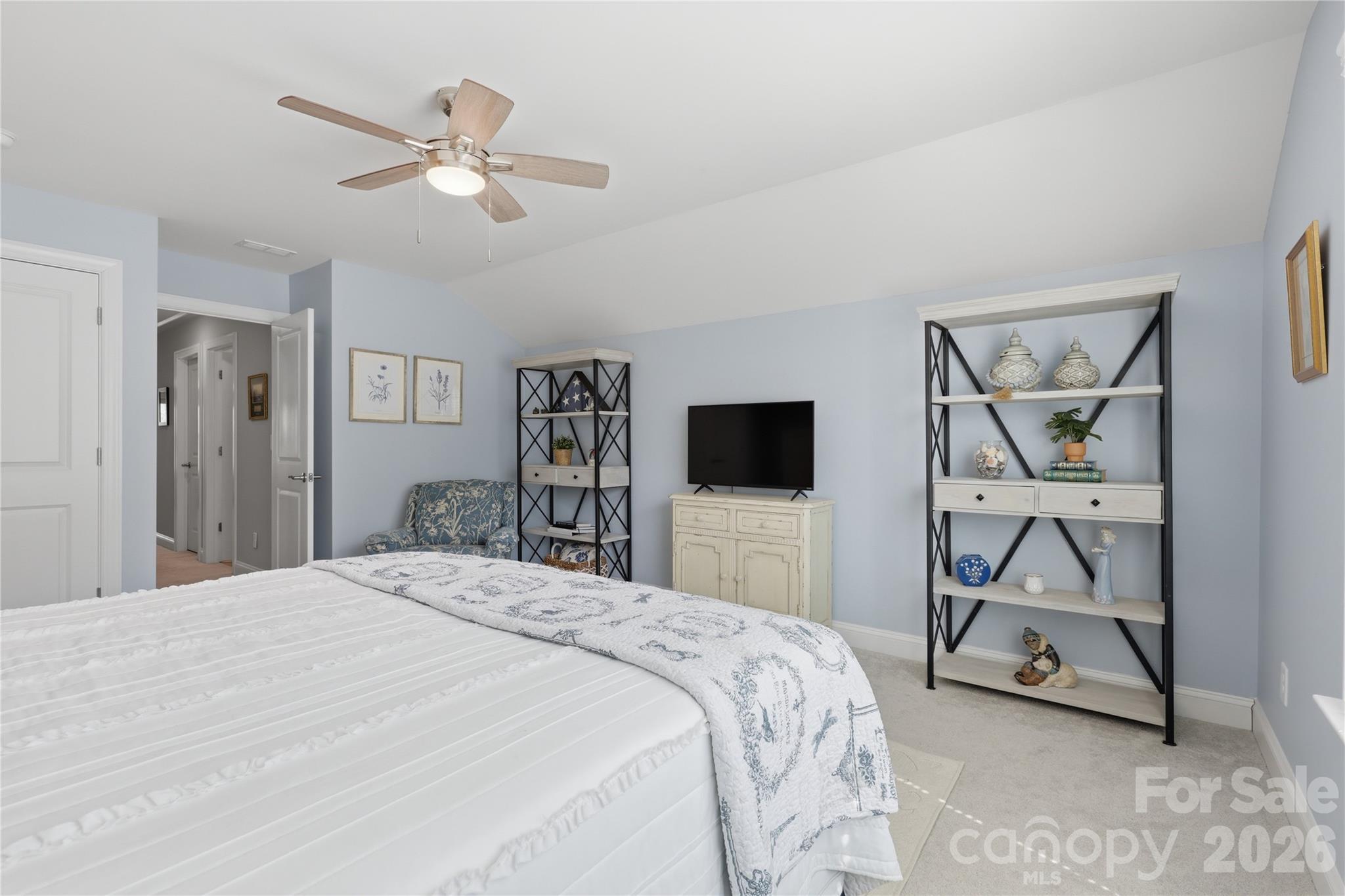 3023 Eagle Ridge Lane Indian Trail, NC 28079 - Photo 38 of 47 a bedroom with a bed and a view of bathroom
