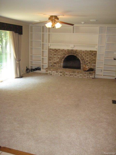 3401 Innsbrook Drive Rochester, MI 48309 - Photo 13 of 23 Gas Fireplace & Built in Shelvin