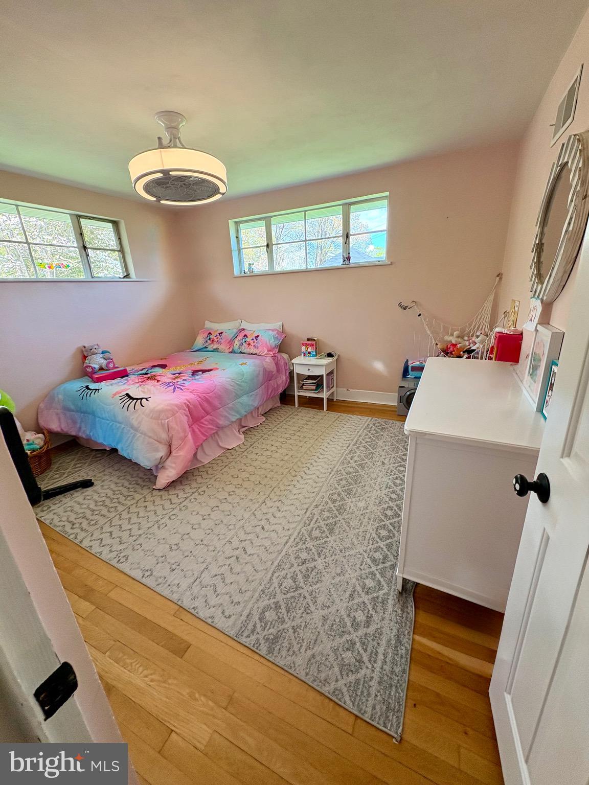 1947 Sand Hill Road Hershey, PA 17033 - Photo 11 of 16 a bedroom with a bed and a chandelier