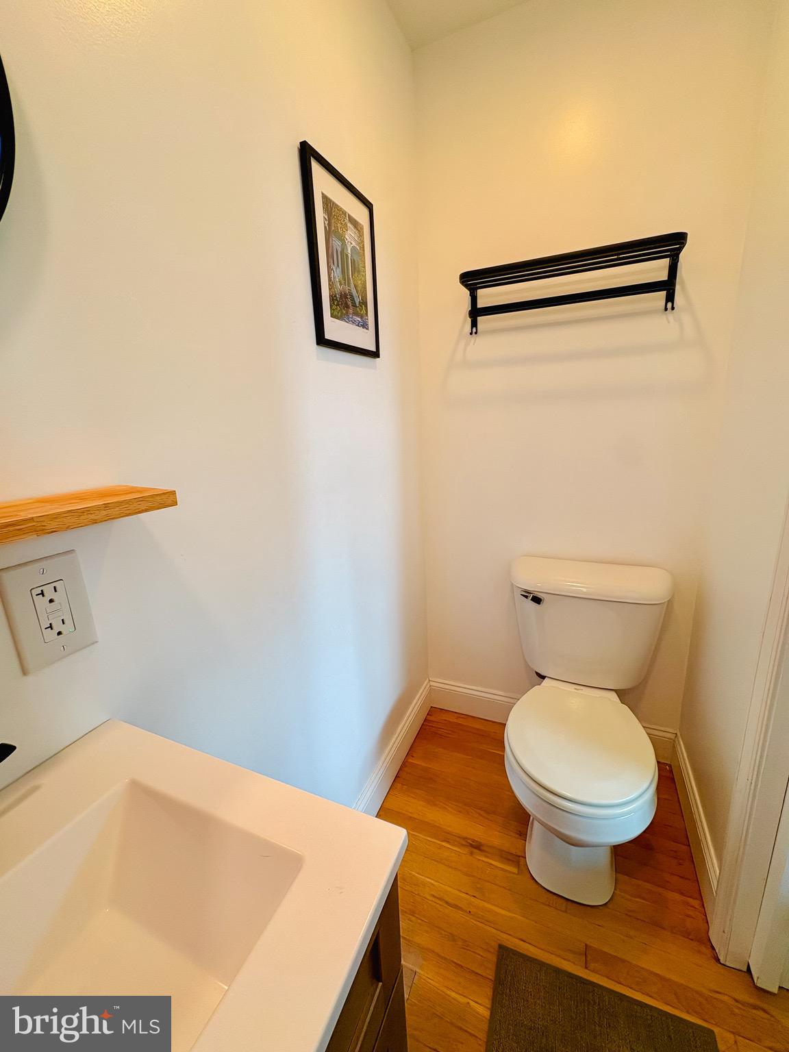 1947 Sand Hill Road Hershey, PA 17033 - Photo 8 of 16 a bathroom with a toilet and a sink