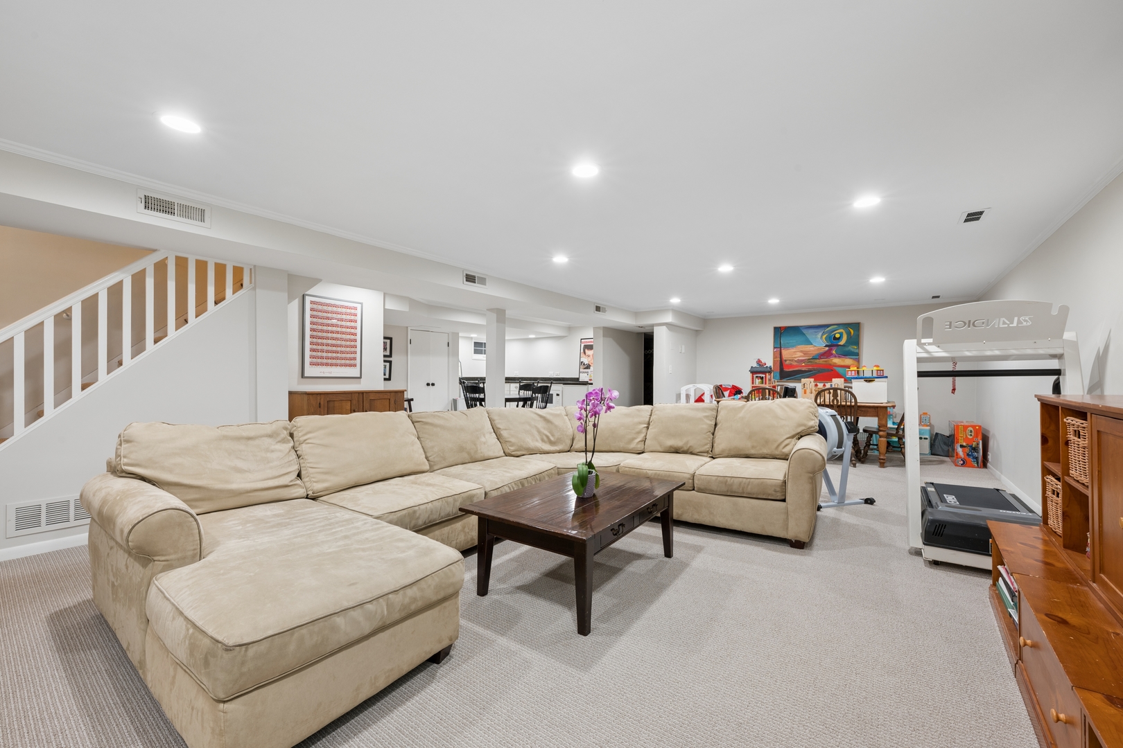 936 Sunset Road Winnetka, IL 60093 - Photo 39 of 50 a living room with furniture and a view of kitchen