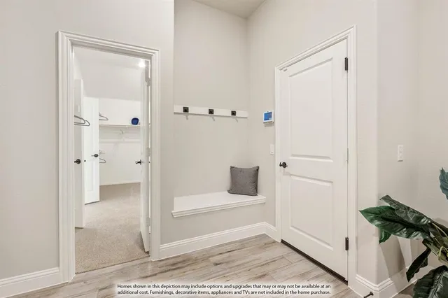 a view of a bathroom with a glass door shower