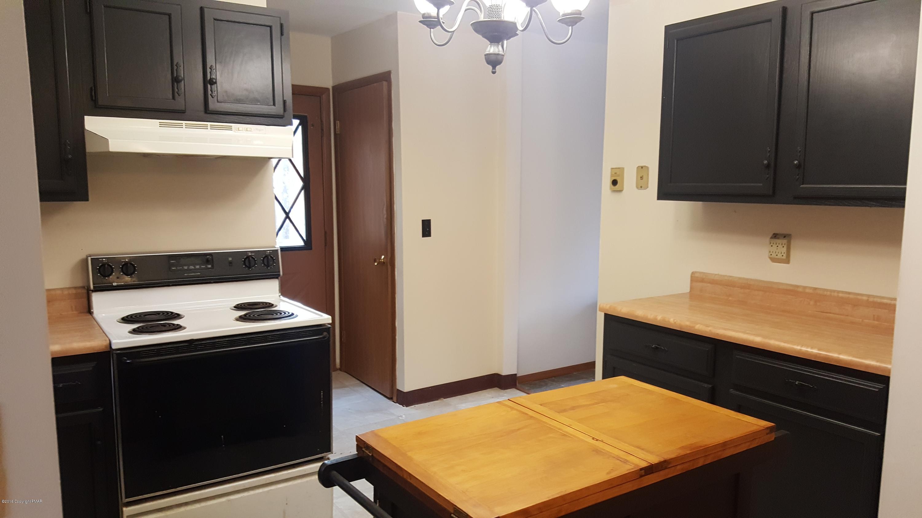 114 Weasel Road Dingmans Ferry, PA 18328 - Photo 21 of 51 a room with storage and utility